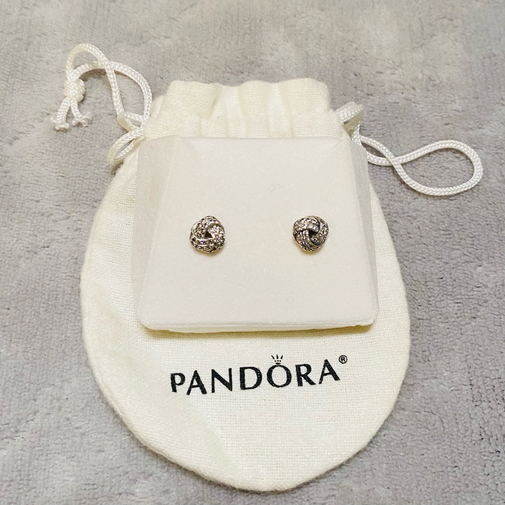 Pandora shimmering knot stud earrings.